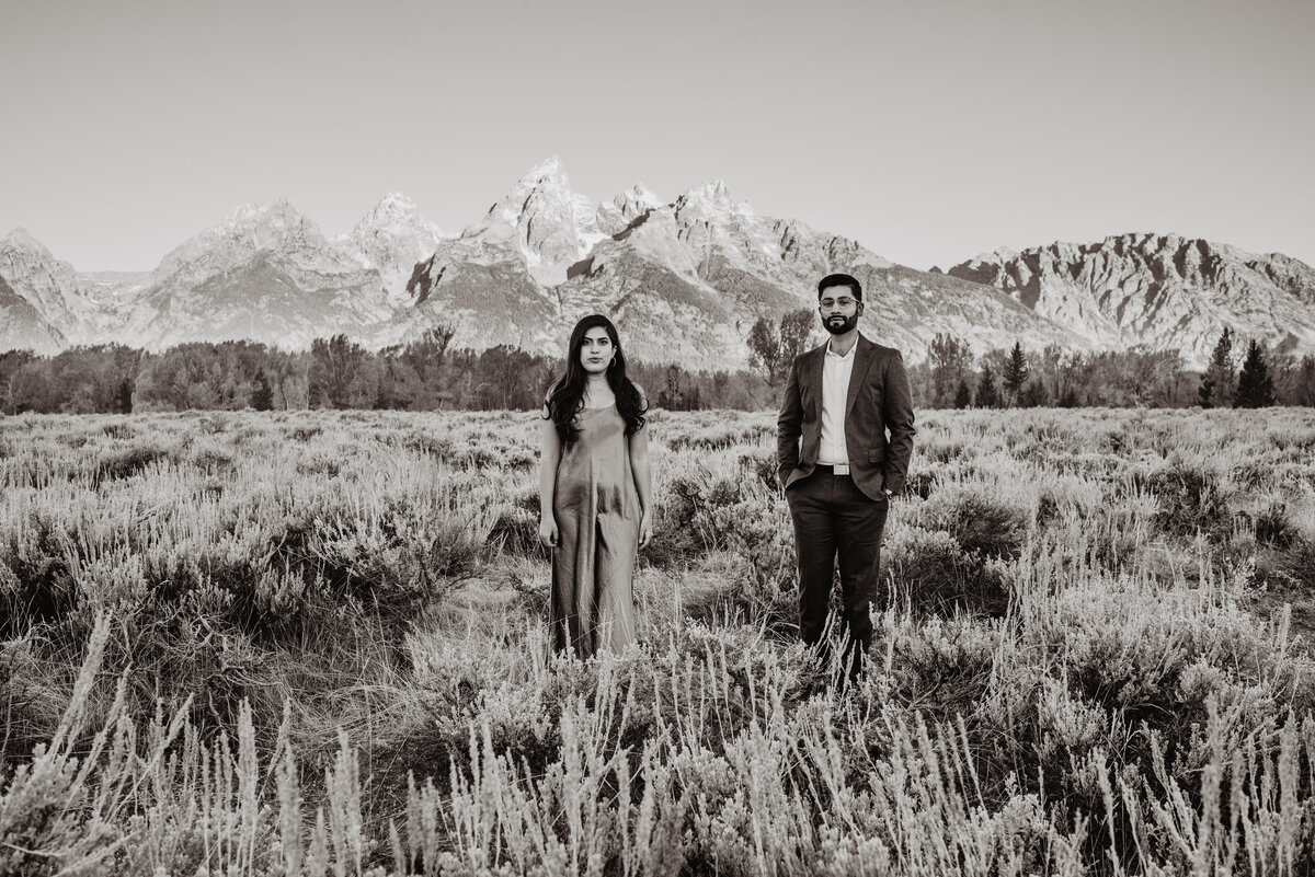 black and white photos of an engaged couple in front of the Tetons for their fall formal engagement session