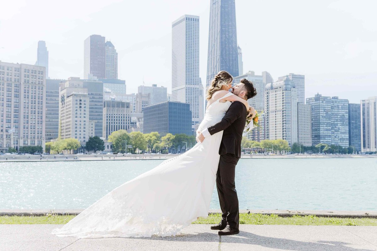 31-groom-lifts-bride-Chicago