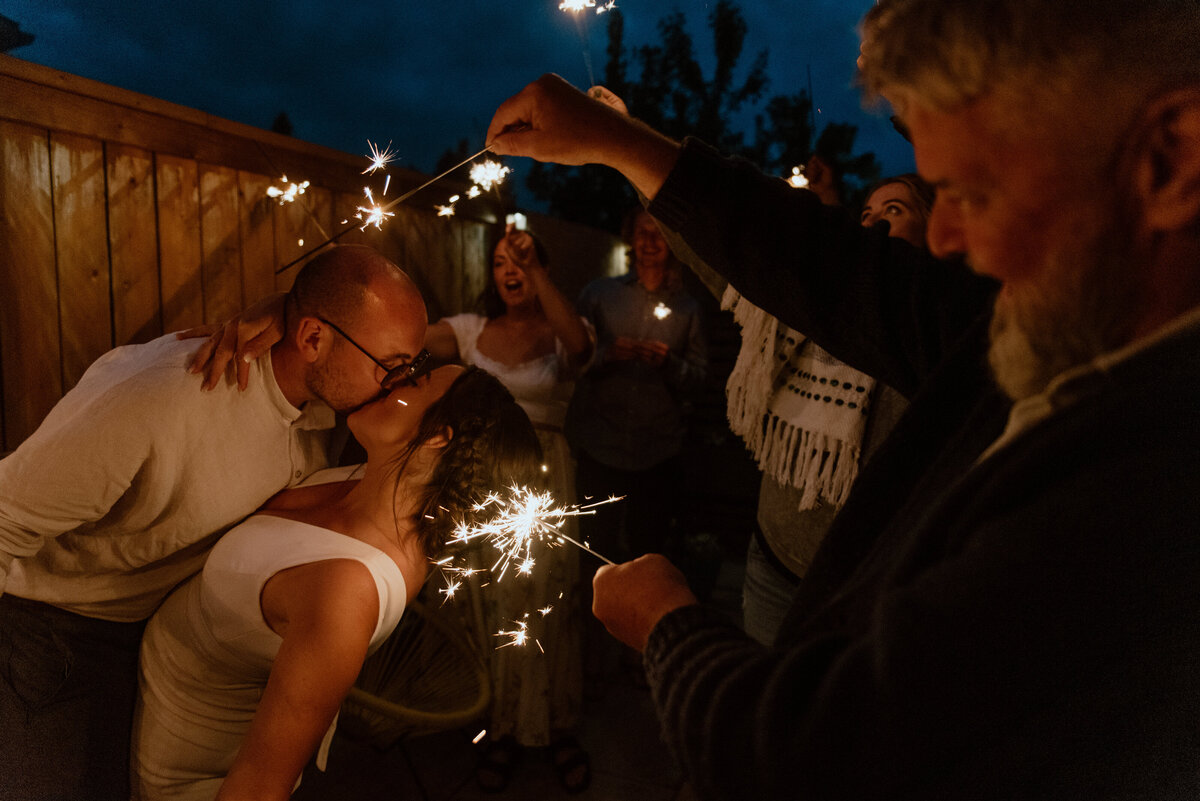 fun sparkler entrance for wedding couple in alberta