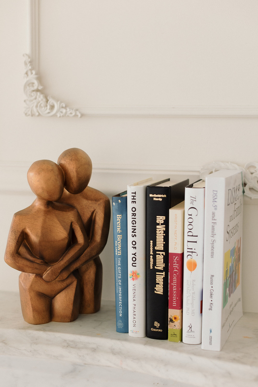 therapy books on shelf