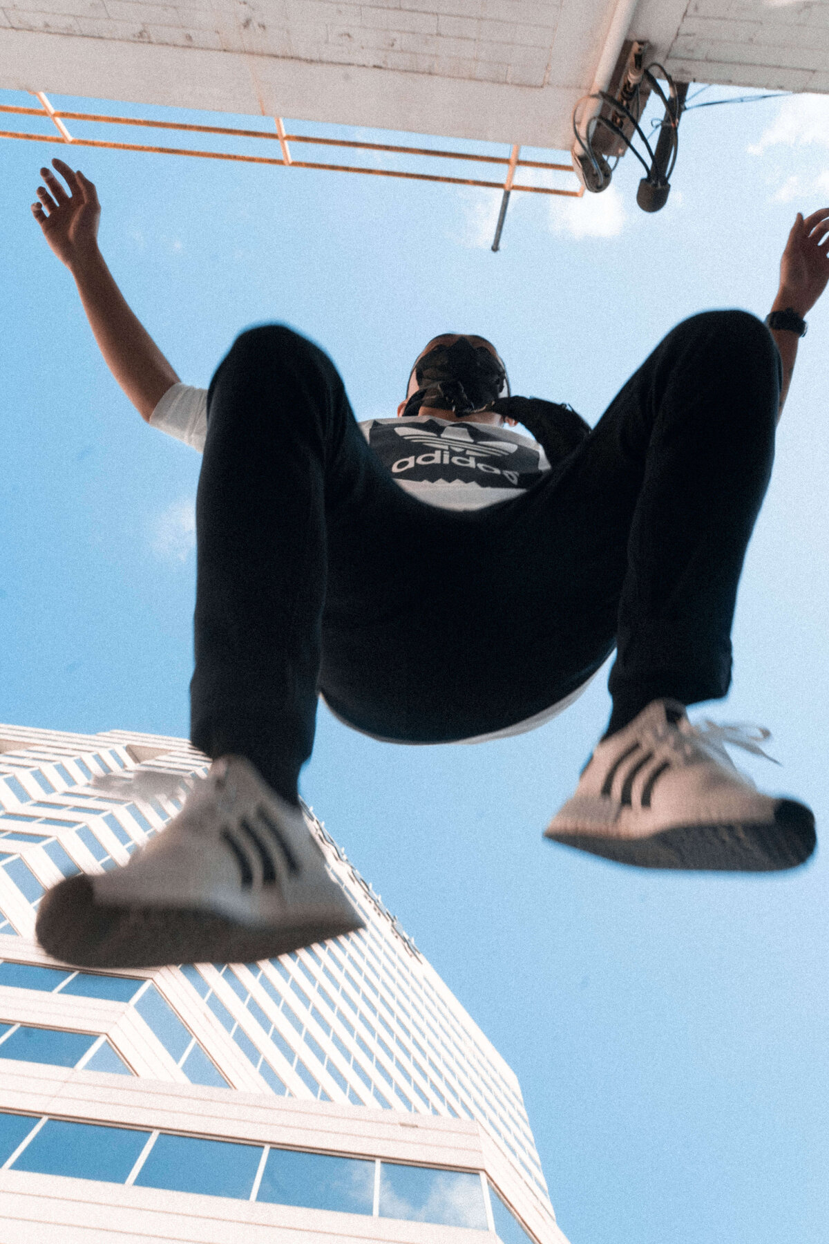 Adidas model jumping over the camera in Charlotte, North Carolina