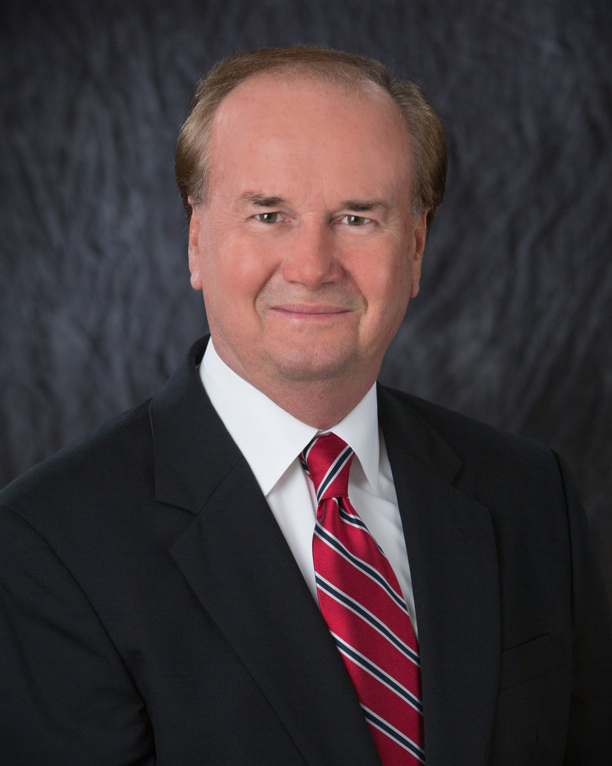 Business portrait of Roger Mills of Theodore, Alabama.