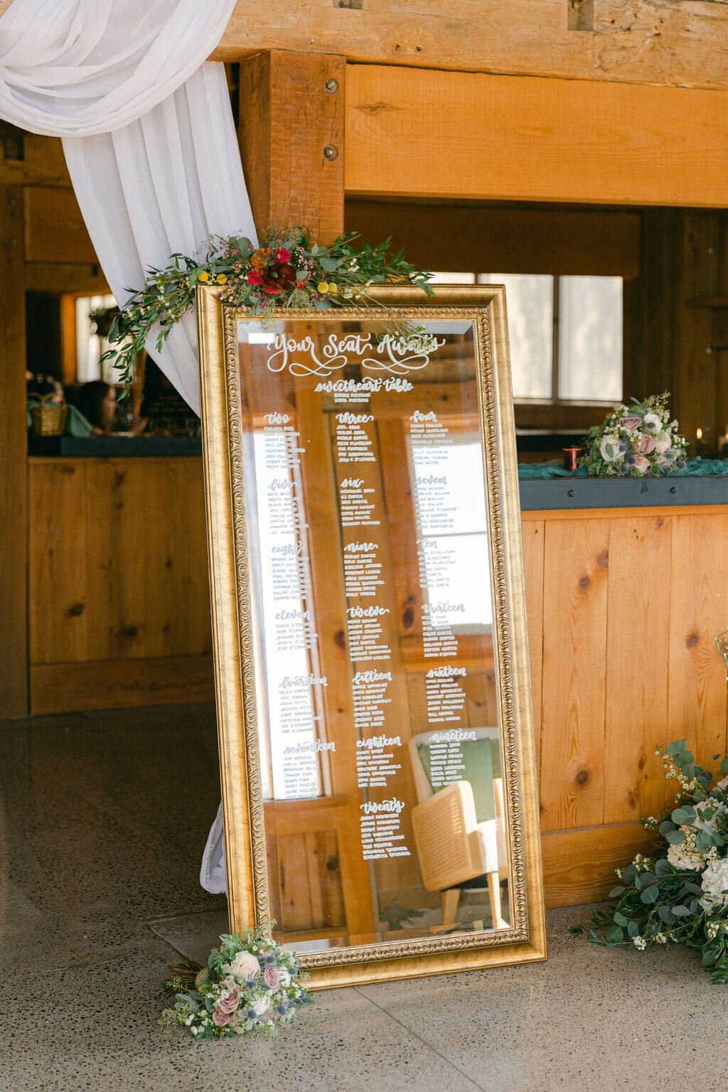 wedding-mirror-seating-chart-barn-venue