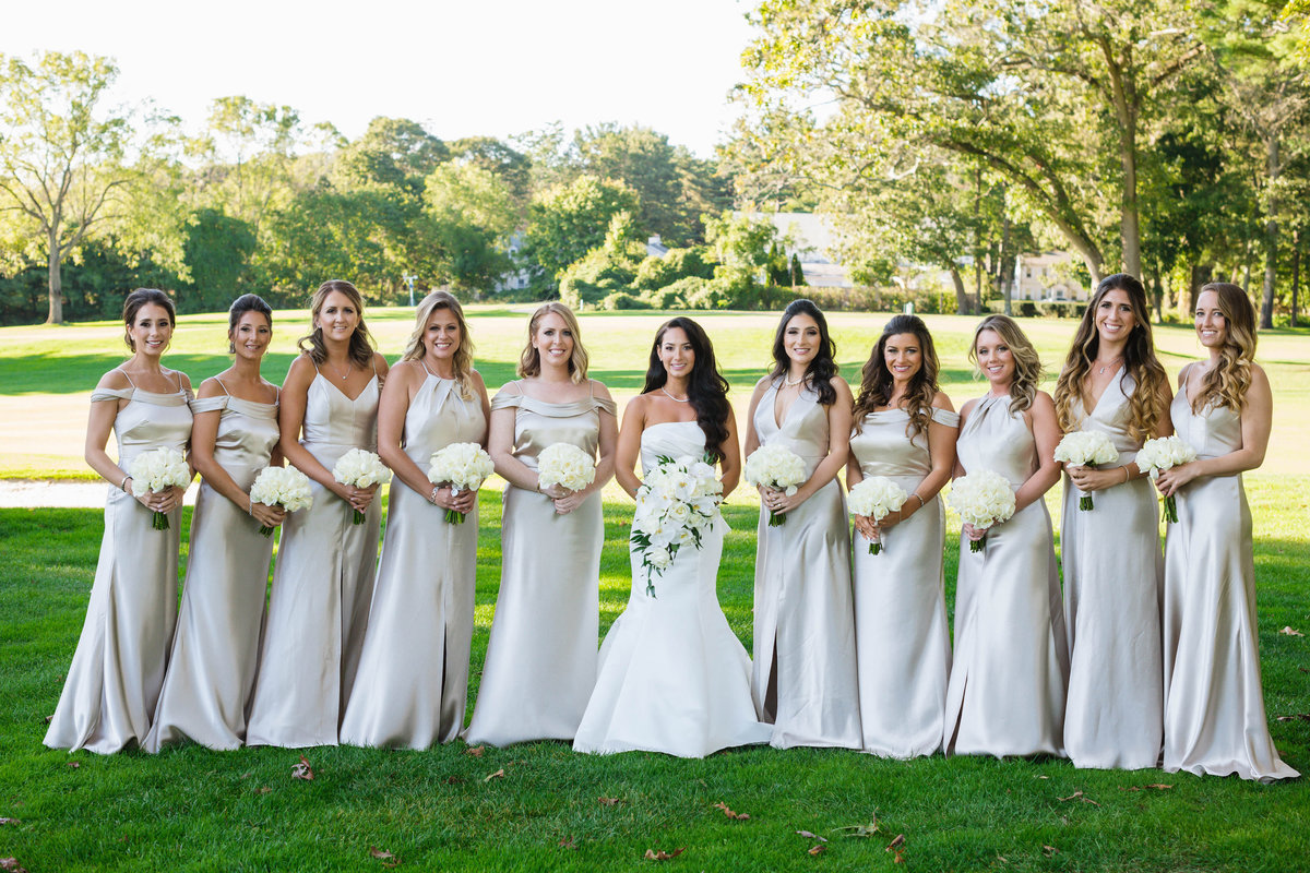 bridesmaids with bride on the greens for wedding at The Muttontown Club