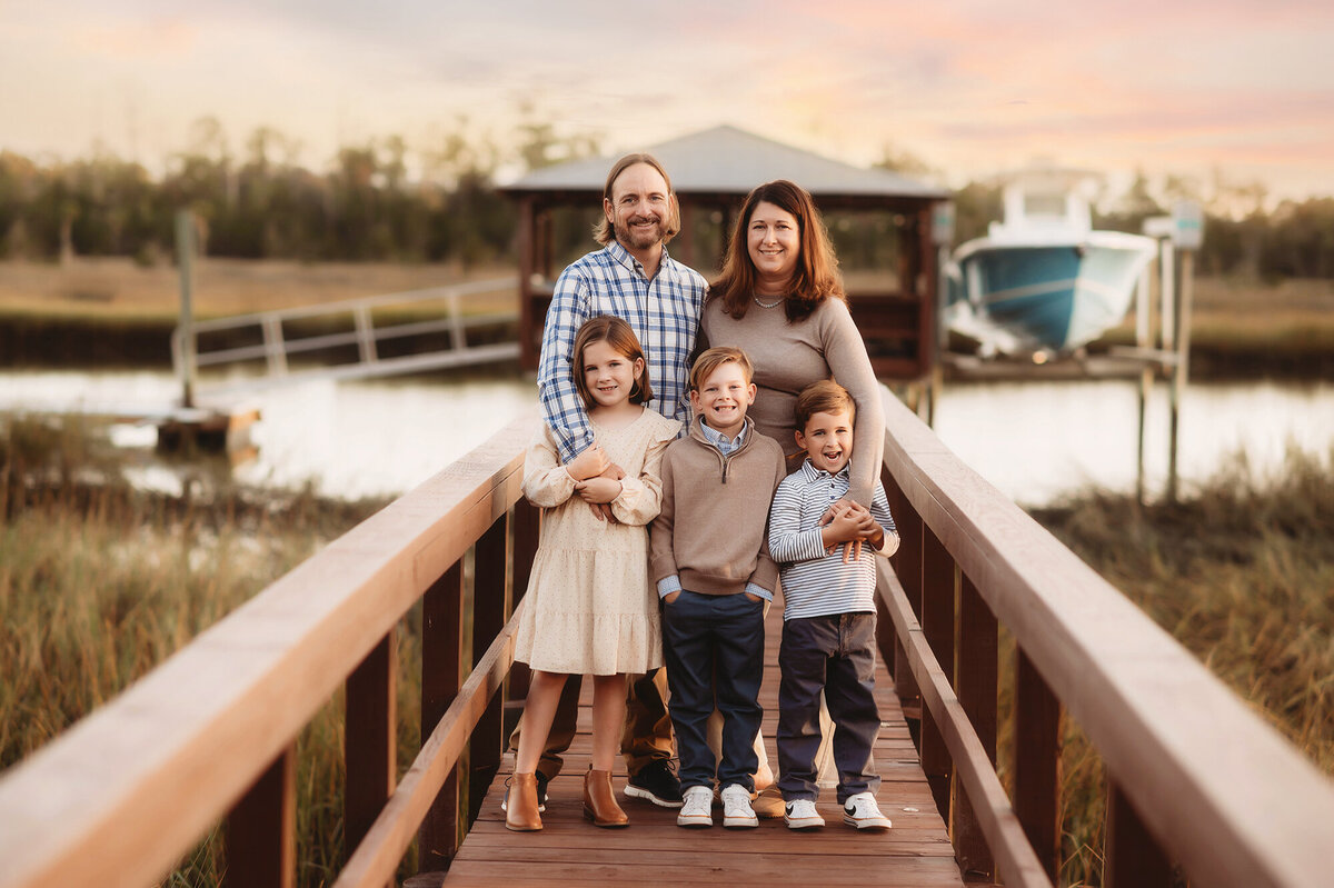 Family poses for Family Portraits in Charleston.