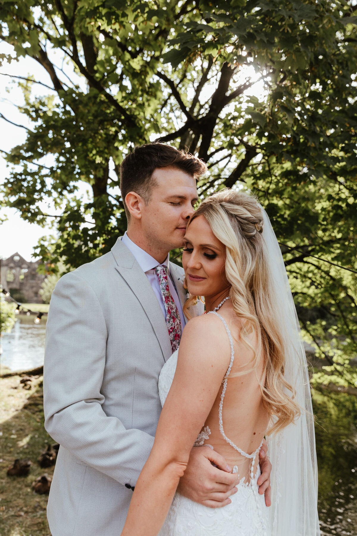 Bride and groom at East Riddlesden Hall golden hour