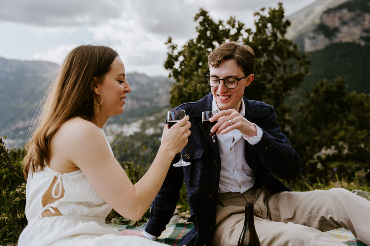 Couple having a picnic above the Amalfi Coast.