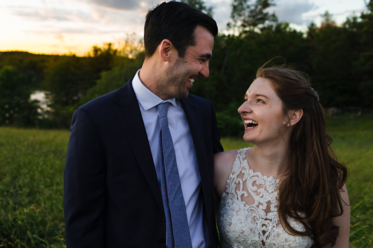 Golden hour smiles from the newlyweds at Kitz Farm in Strafford NH