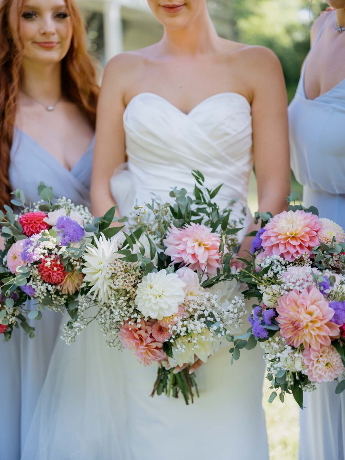 Colorful bridal bouquets for a private residence tented wedding.
