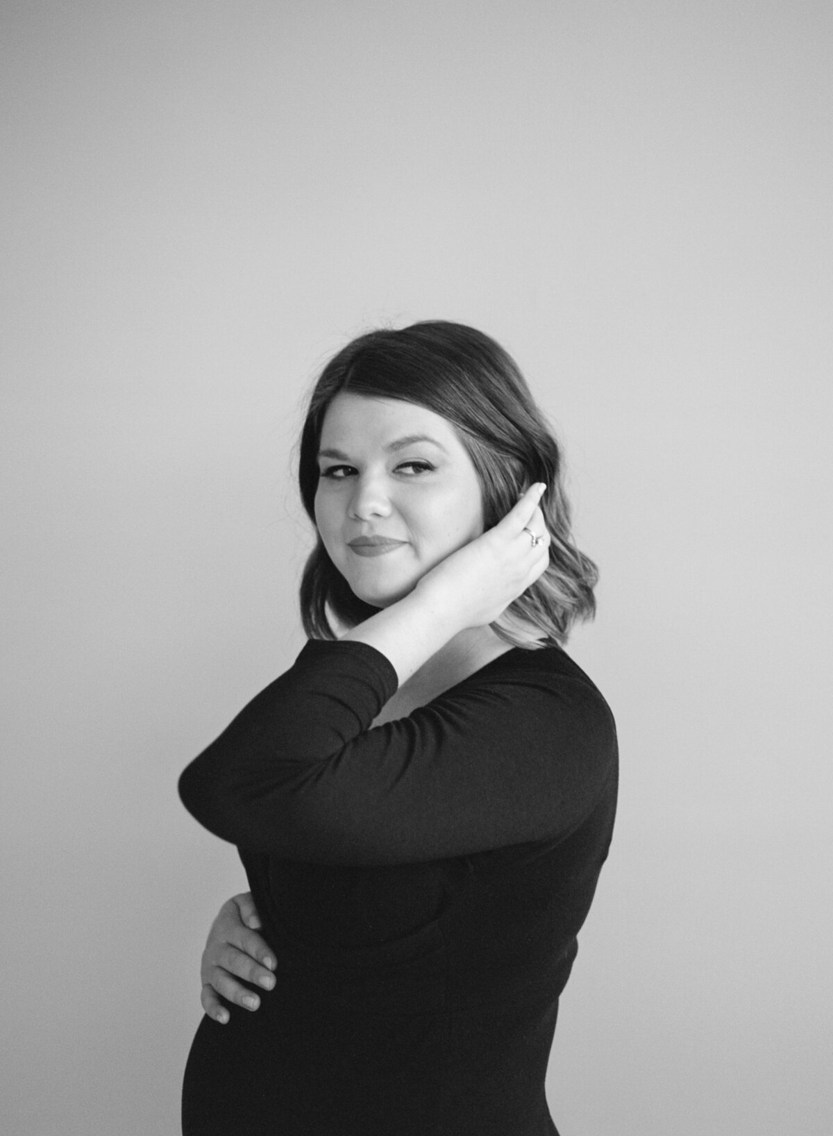 intimate maternity photo photography studio black dress photo