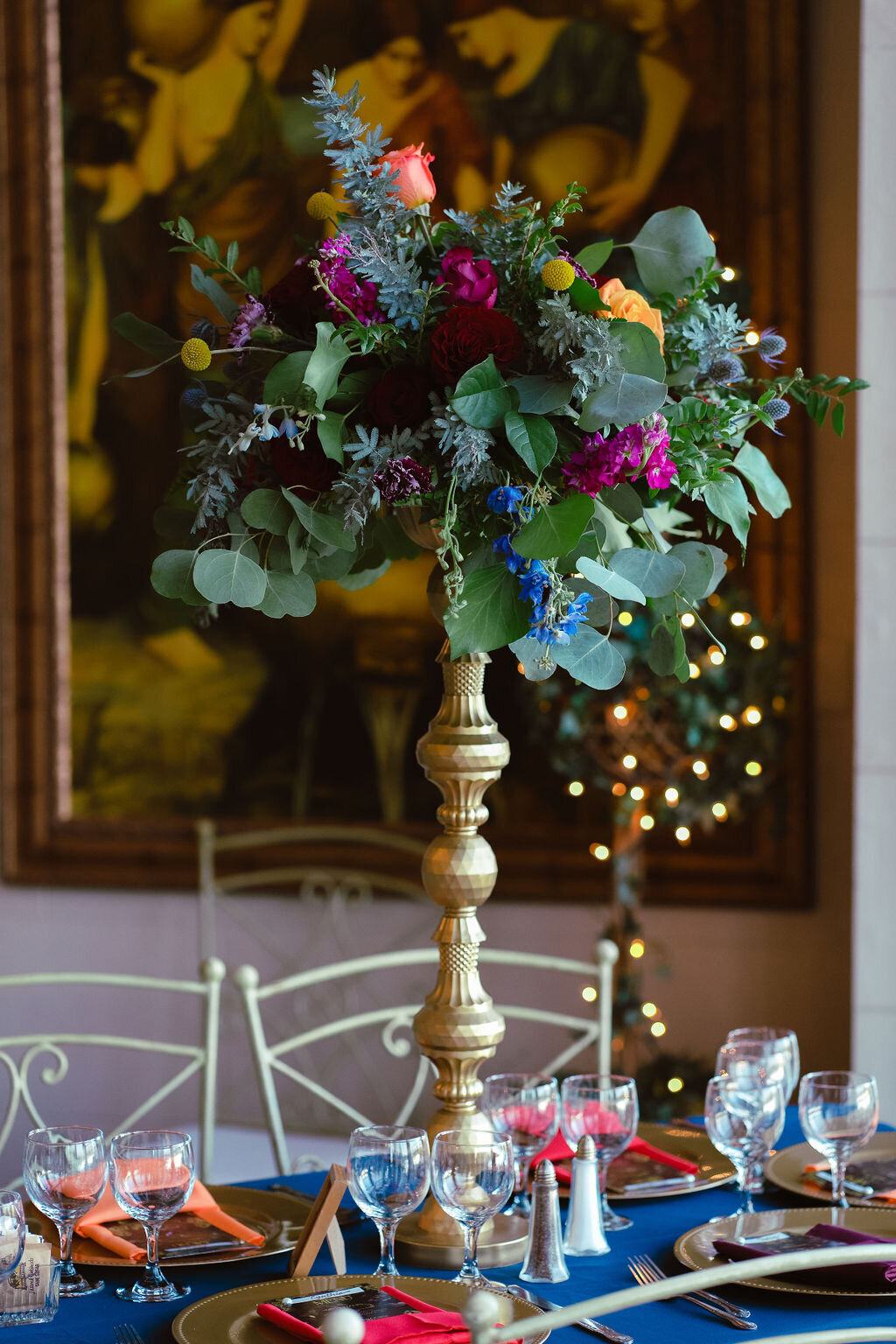 Vibrant centerpiece for a wedding reception table.