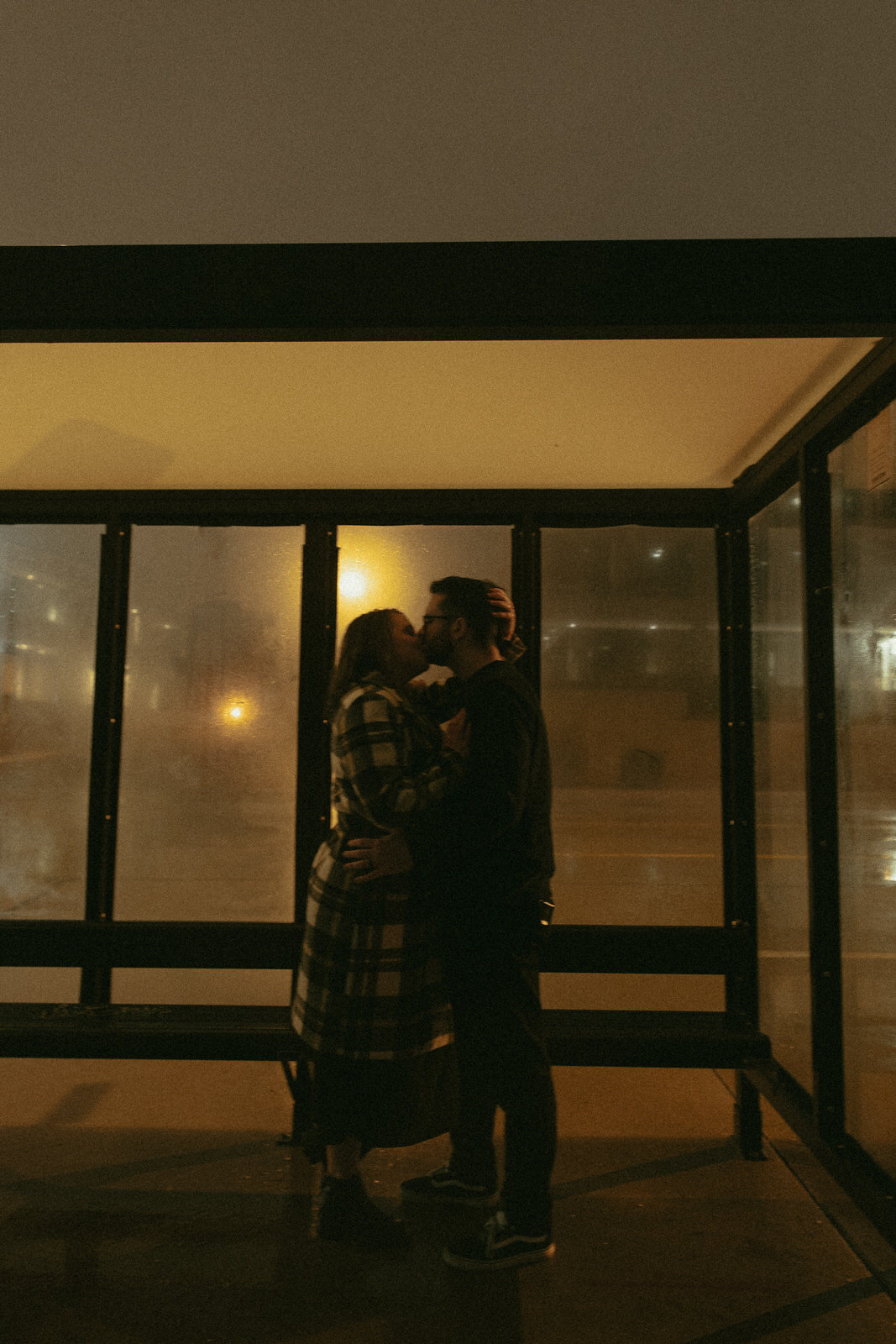 couples-rain-playful-night-session-downtown-moody-umbrella-film-illinois-62