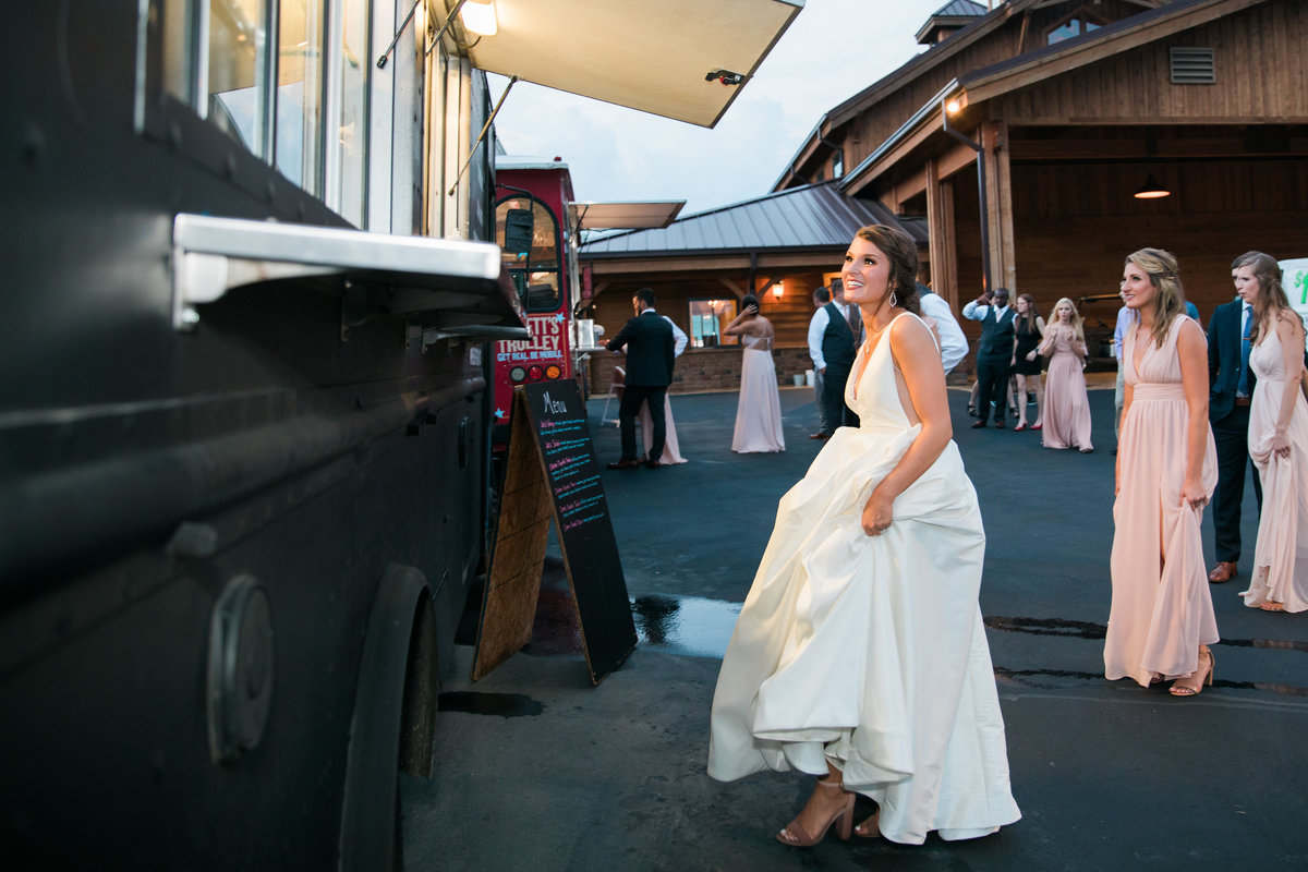 Bride and groom getting dinner.