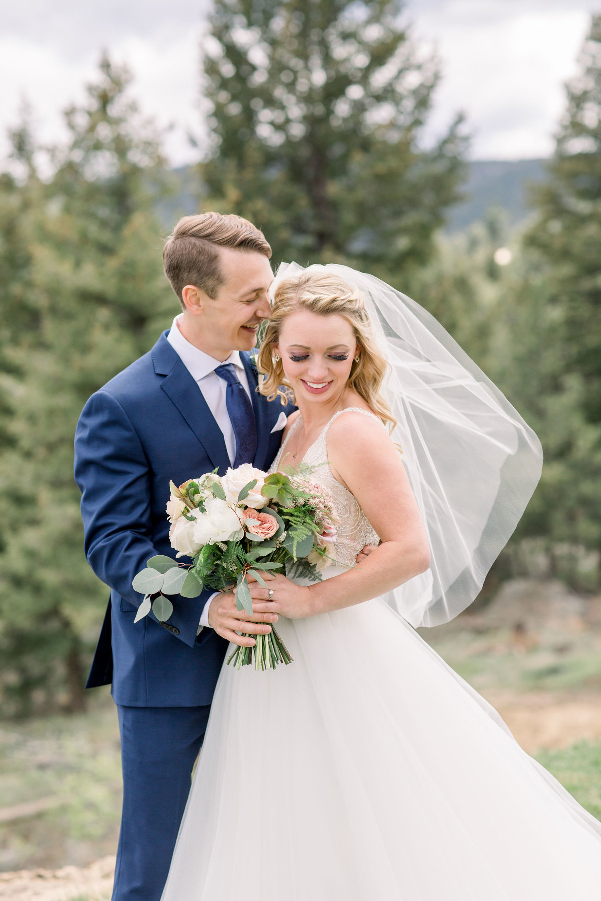 Bride and groom laughing