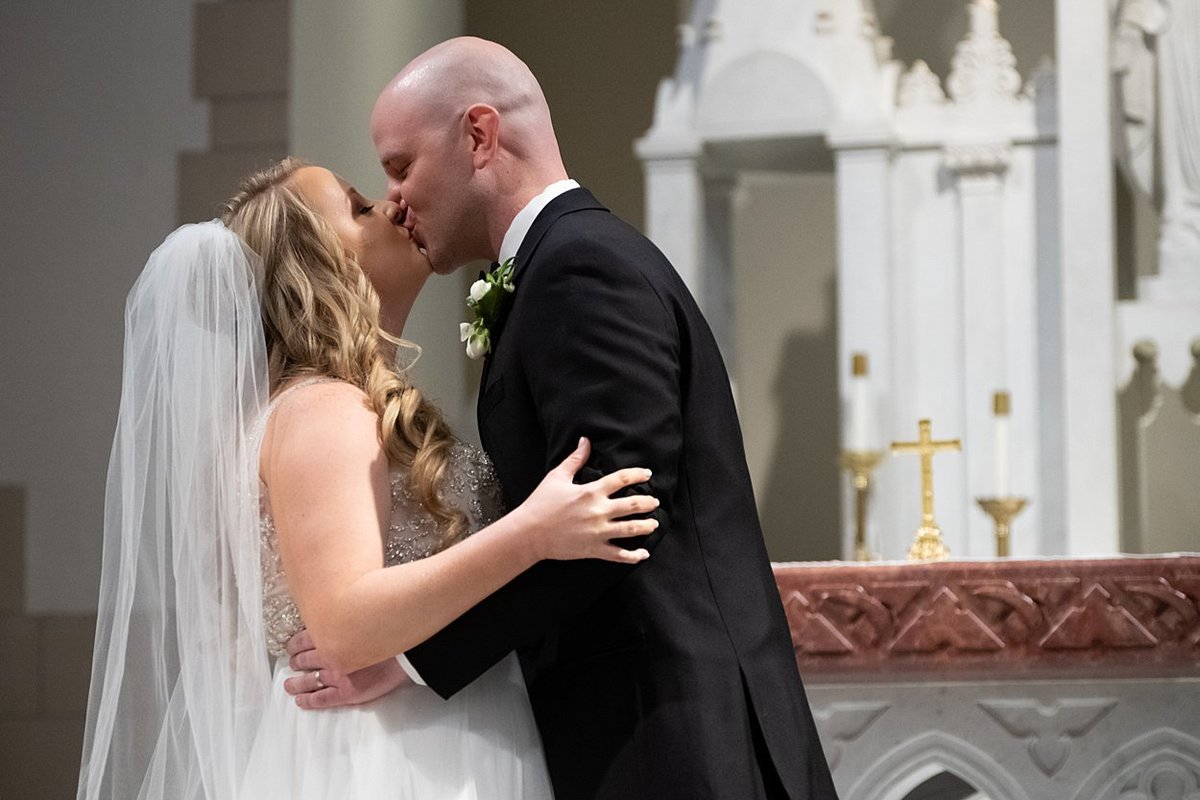 Bride and Groom's First Kiss at First Presbyterian Church in Beaver, PA