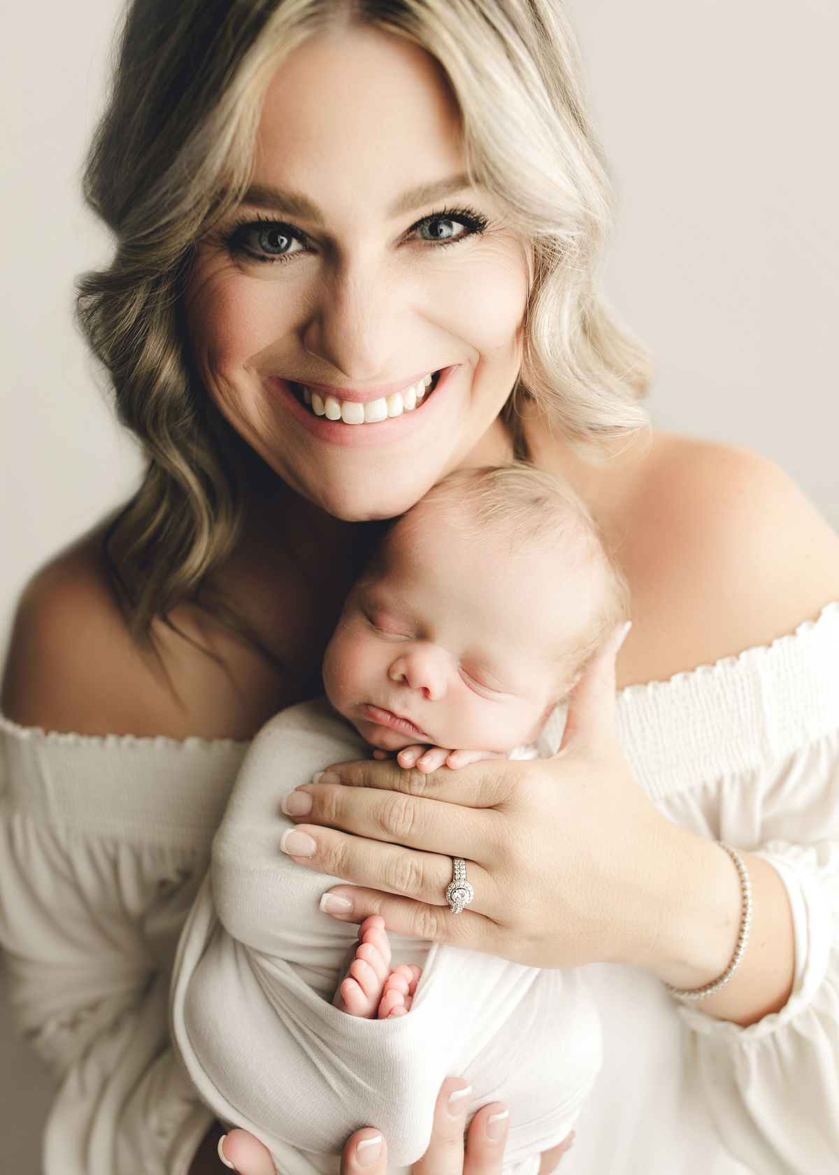 Fort Collins mom holding her new baby