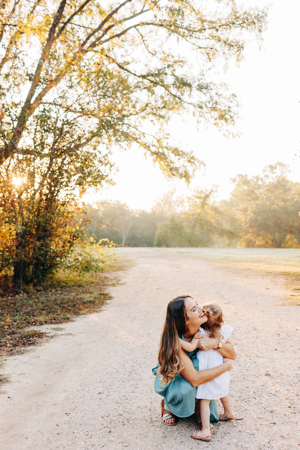 mother hugging her daughter