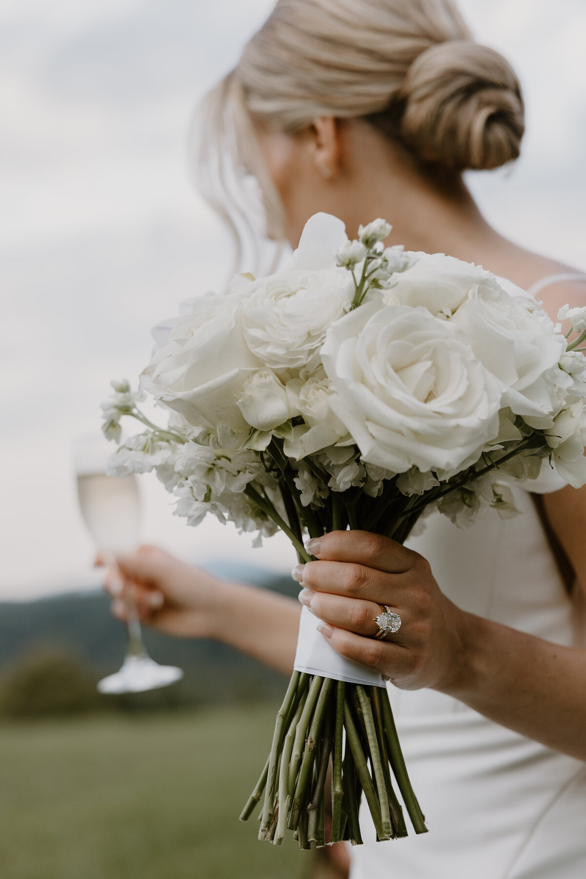 Close-up of simple elegant bridal bouquet with neutral blooms at the Biltmore