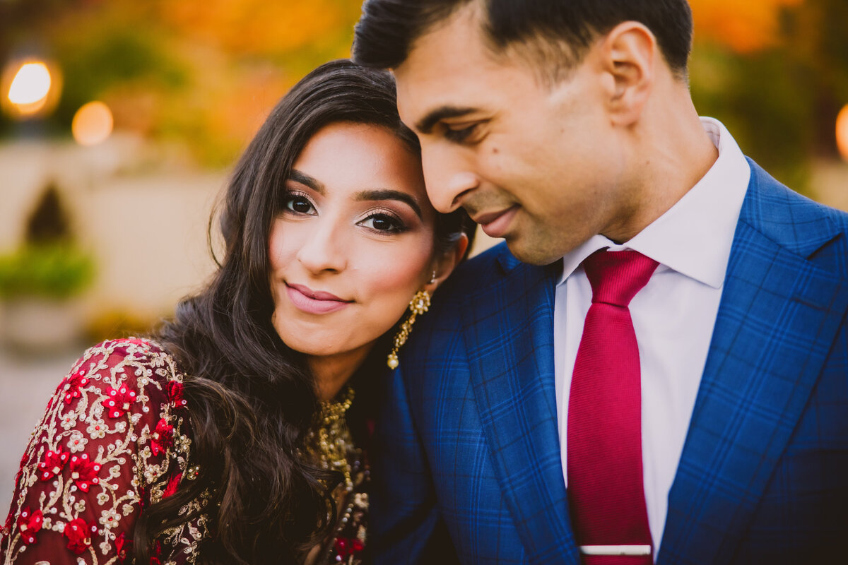 a closeup of a south asian indian bride and groom before their wedding reception at the marigold nj