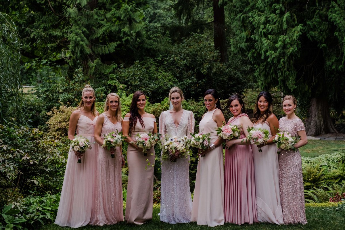 Lovely bridal party in the gardens at Chateau Lill