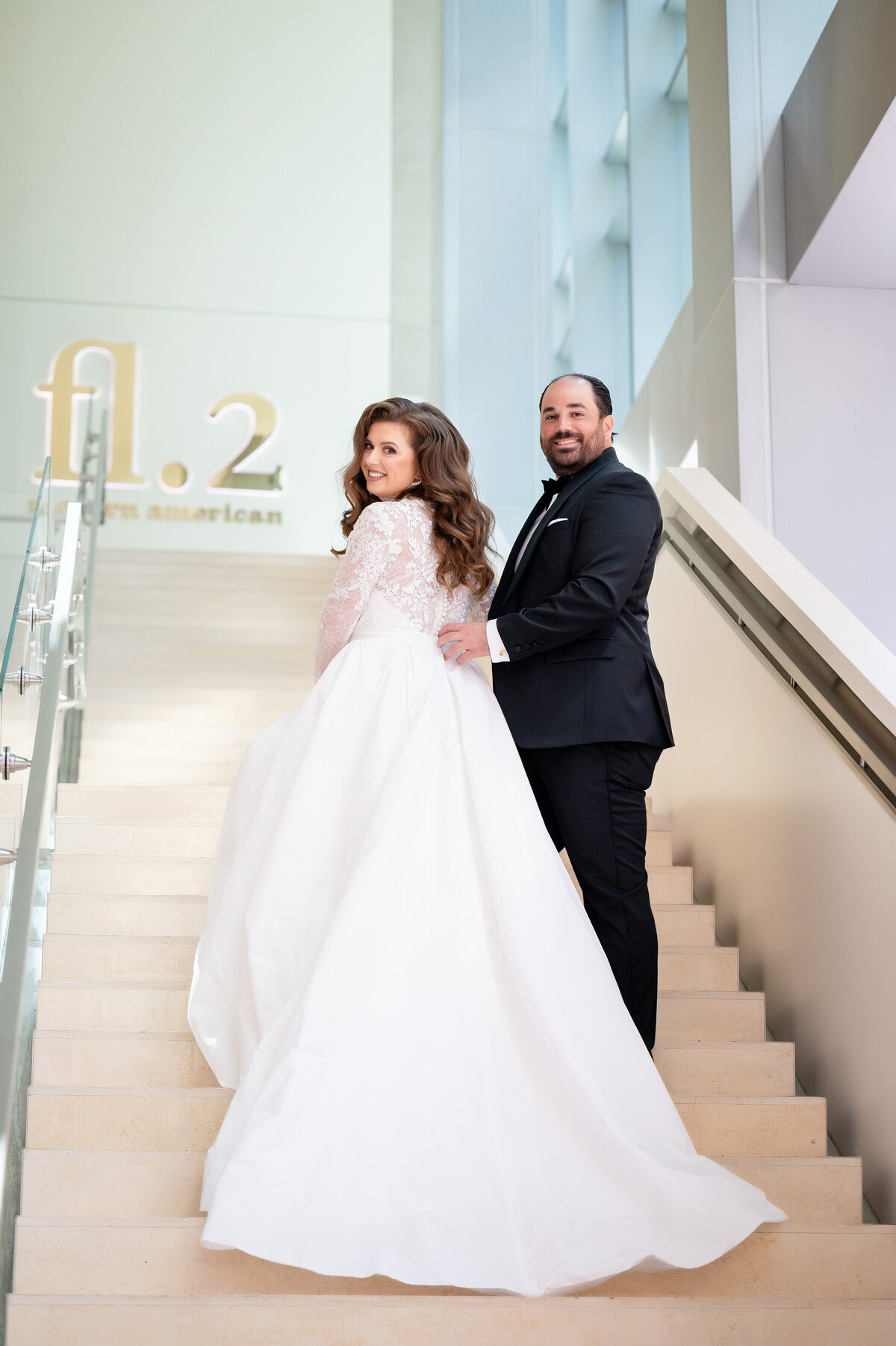 wedding photo on the staircase at fairmont hotel