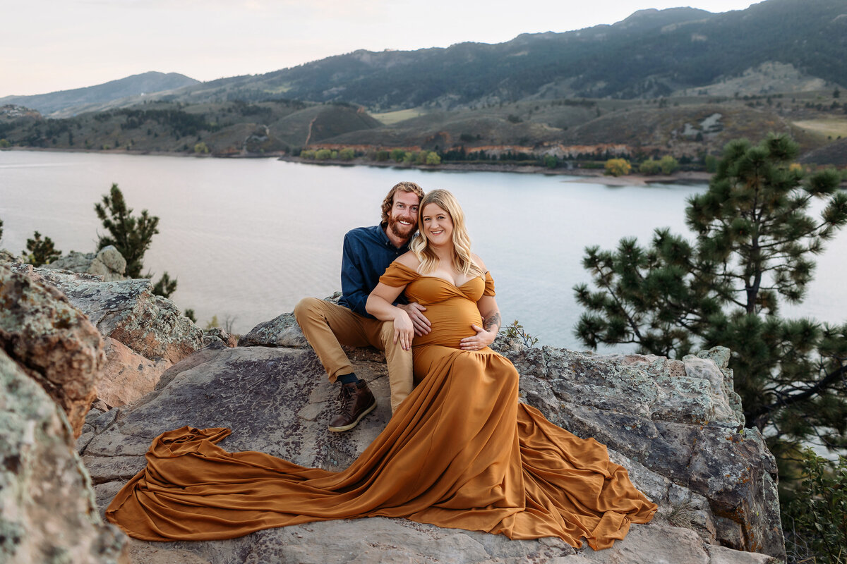fall maternity photos at horsetooth reservoir with gorgeous couple