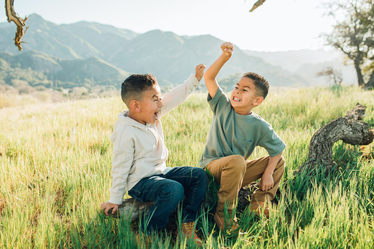 Family Portrait Photo Of Two Boys Raising Their Hands Los Angeles