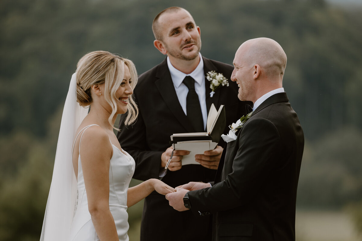 Bride and groom exchange vows during an intimate Biltmore Estate wedding ceremony in Asheville, NC