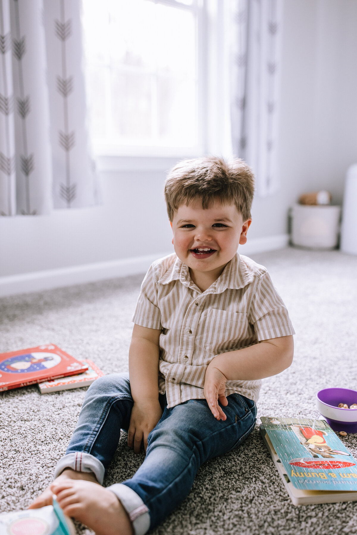 Little boy playing on the floor at home in Pittsburgh. 