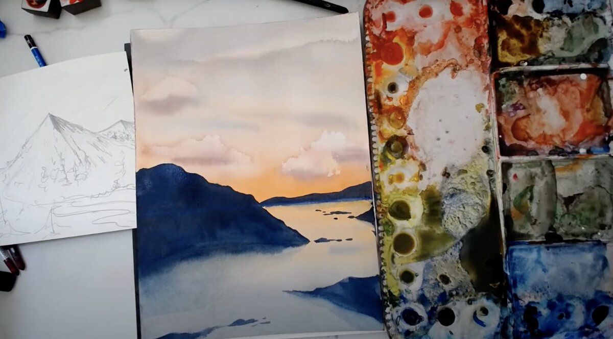 live-2023-08-14-orange-skies-ocean-mountain-landscape-1
