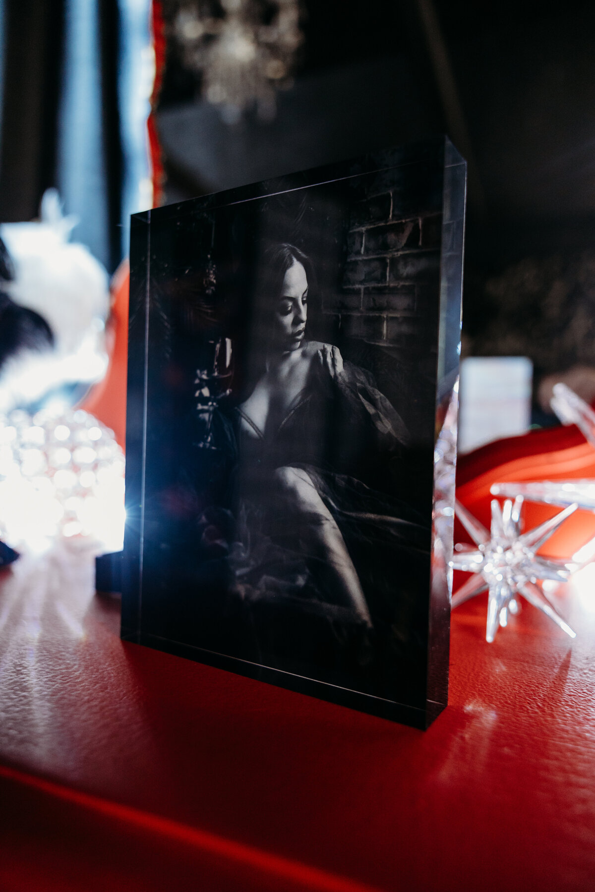 Boudoir photography keepsake diamond block photo on red chair in Lubbock, Texas photographer in Amarillo TX