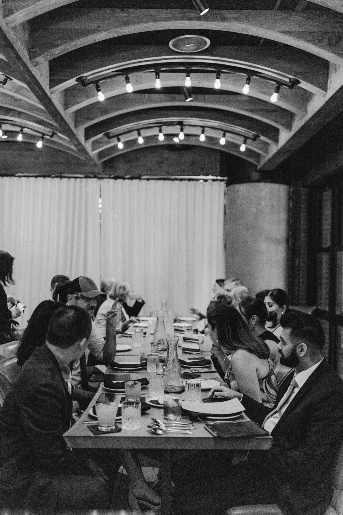 Guests sitting down for wedding dinner at Proper hotel Austin