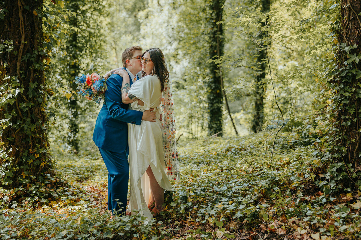 colorful lgbt wedding elopement in a green forest in salem oregon