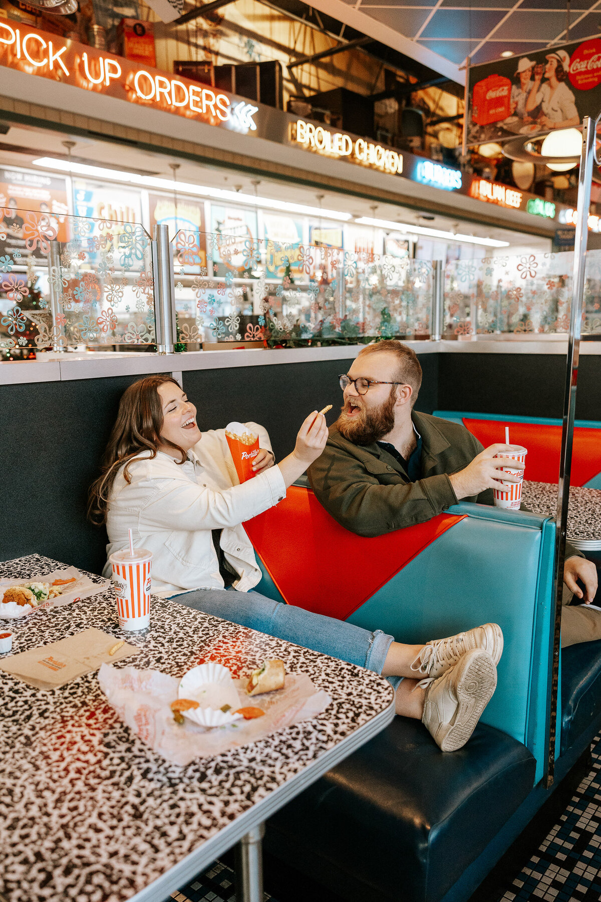 creative fun chicago flash engagement photos at Portillos Hotdogs-33-ed-lucy