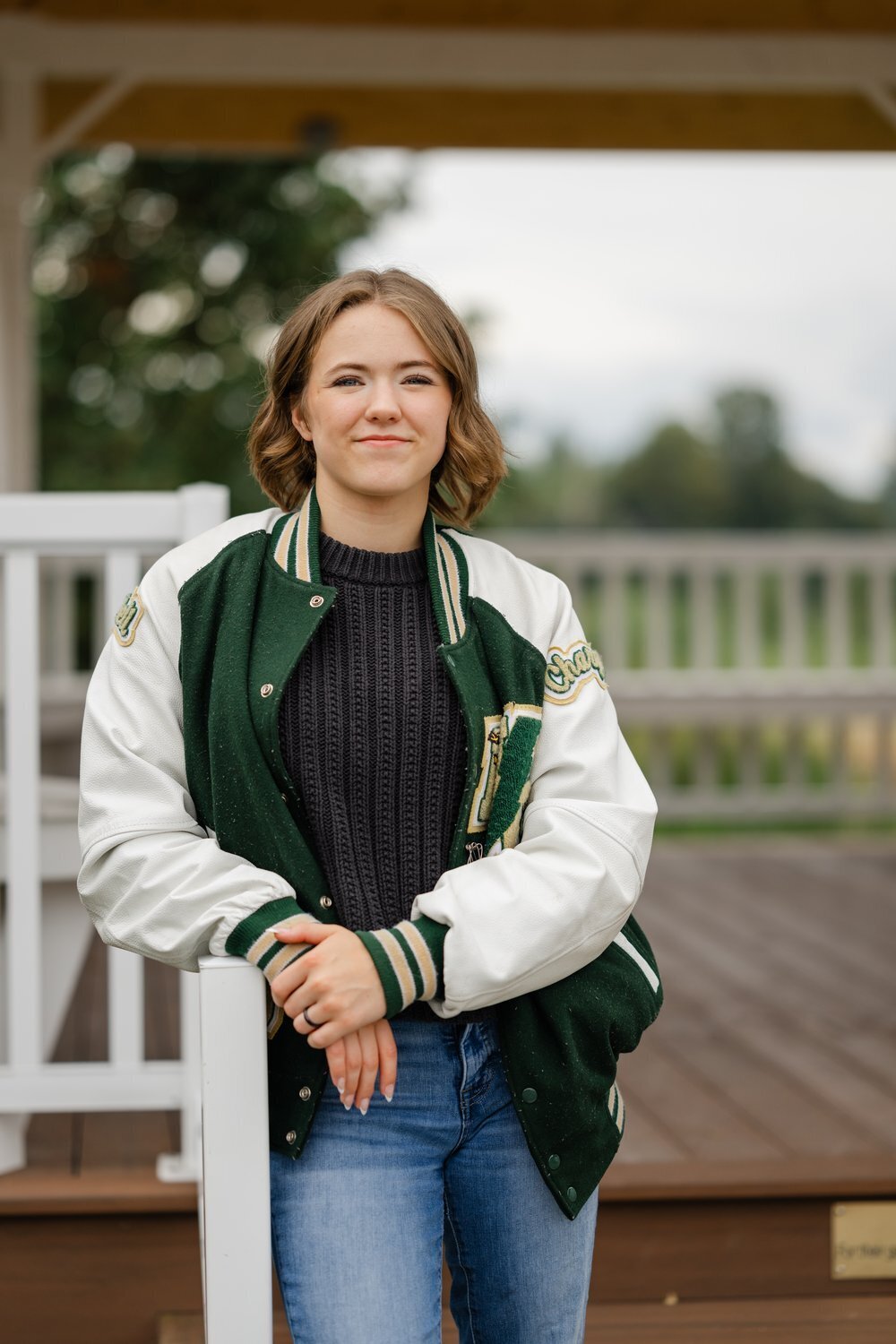 snohomish senior girl in letterman jacket