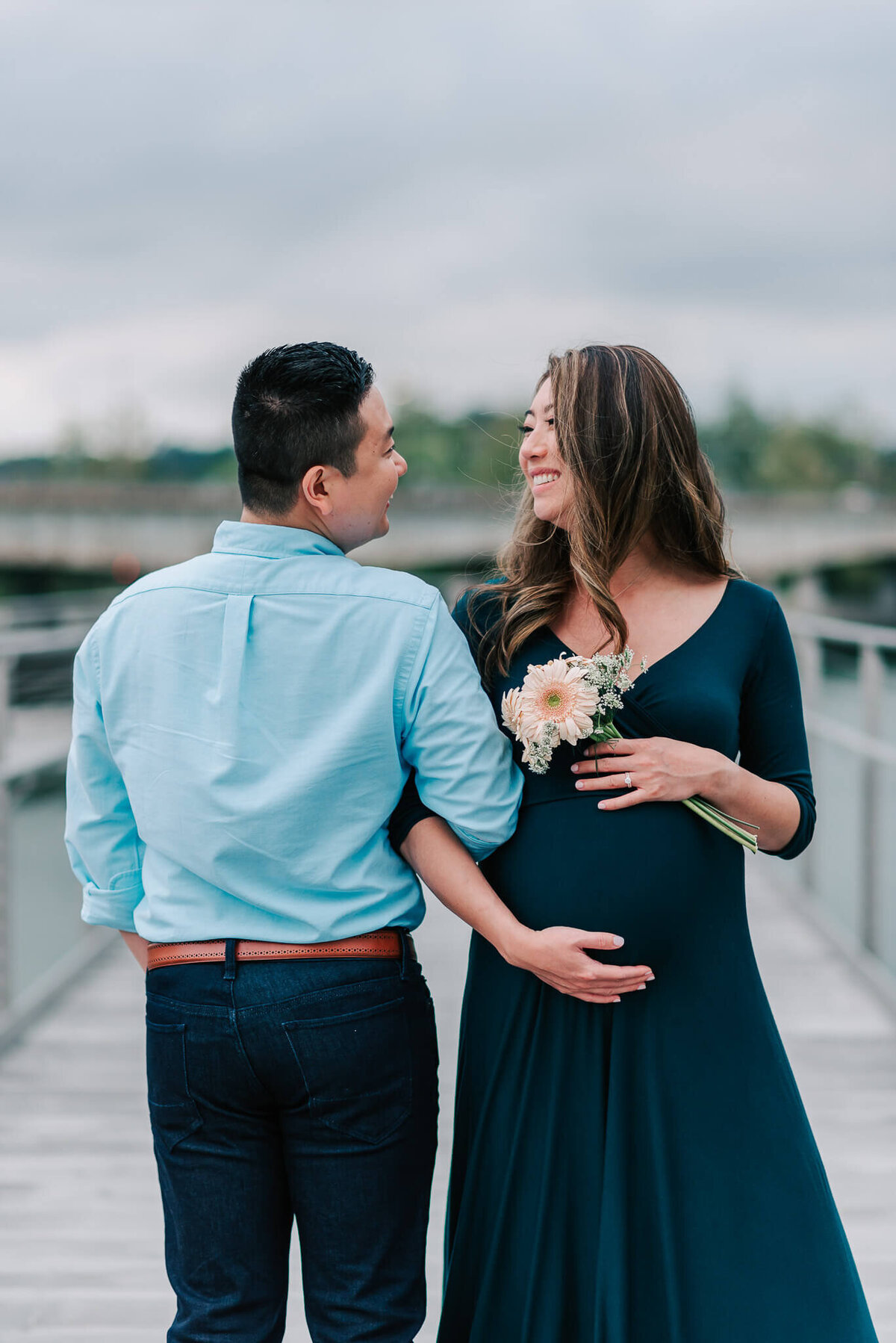 Maternity photos at the Kennedy Center on a cloudy evening