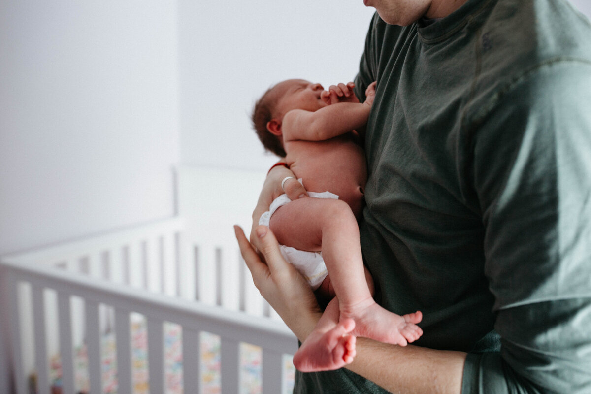 dad-holding-daughter