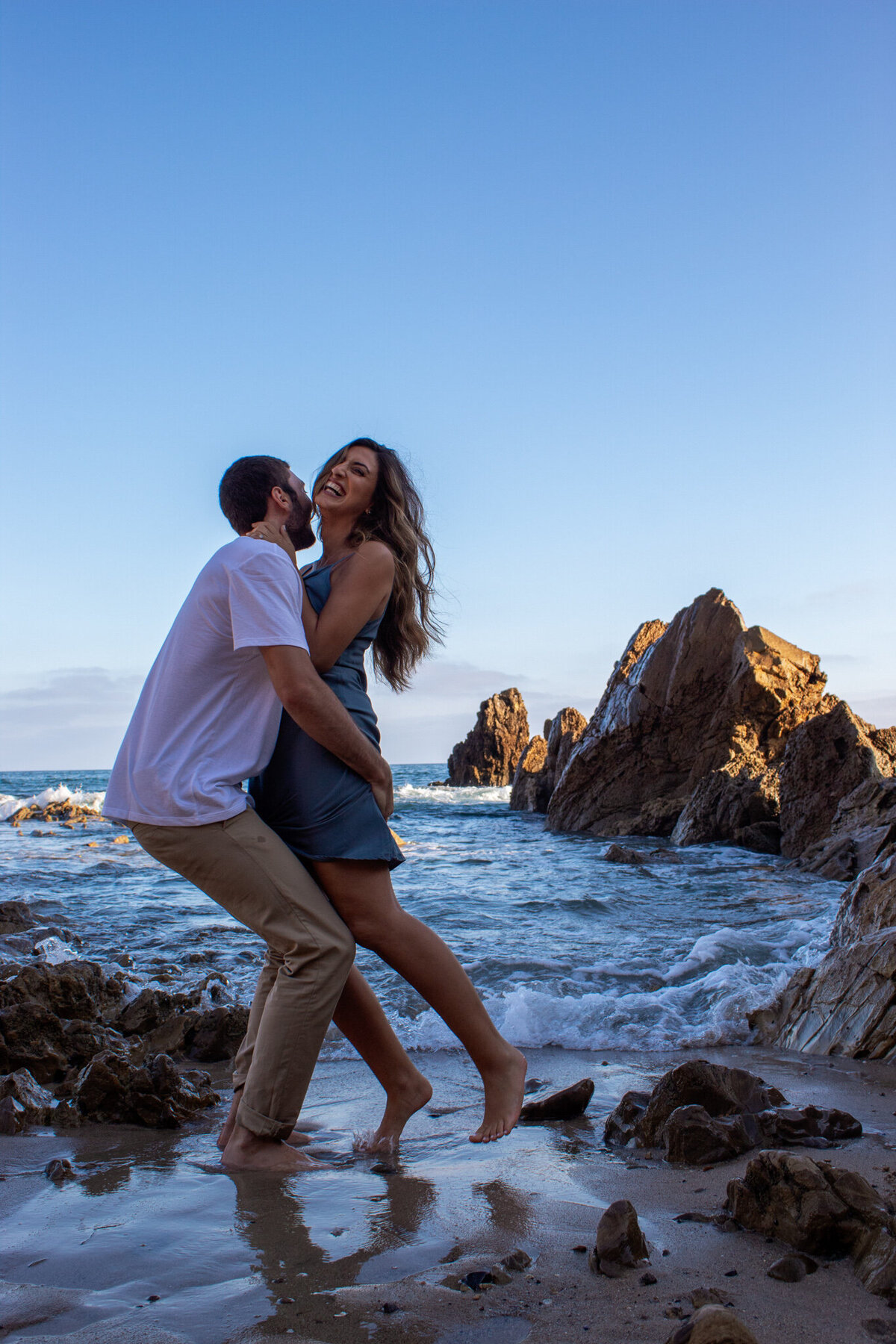 san diego couple cuddle on the beach