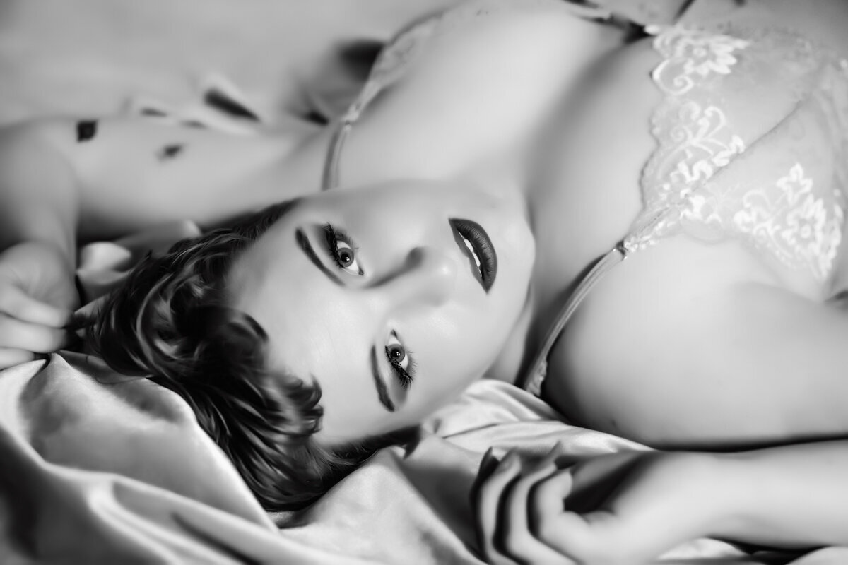 Old hollywood style black and white image of a girl with short hair taken by Minnesota photographer