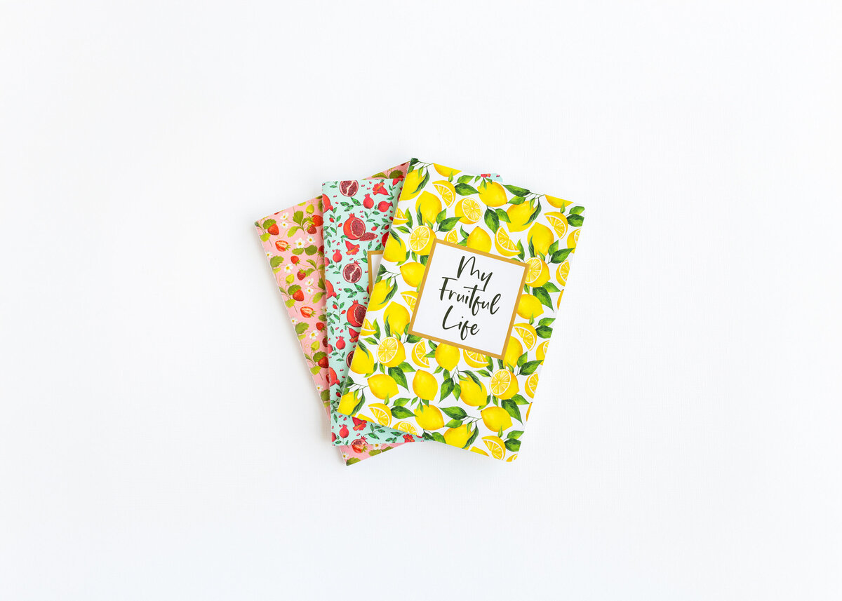 Product photography of colorful notebooks