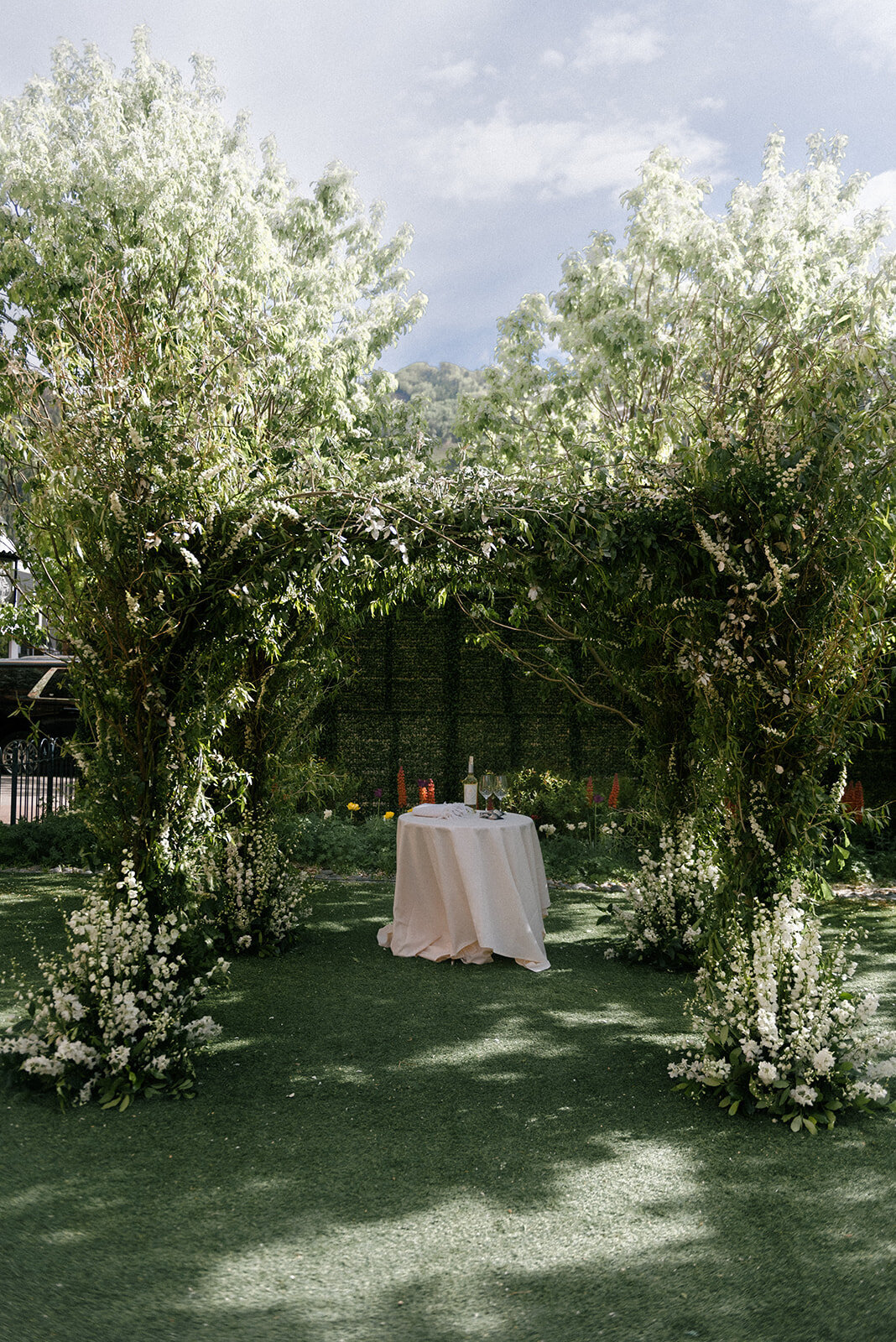 Aspen Hotel Jerome Wedding Calluna Events wedding style huppah greenery ceremony