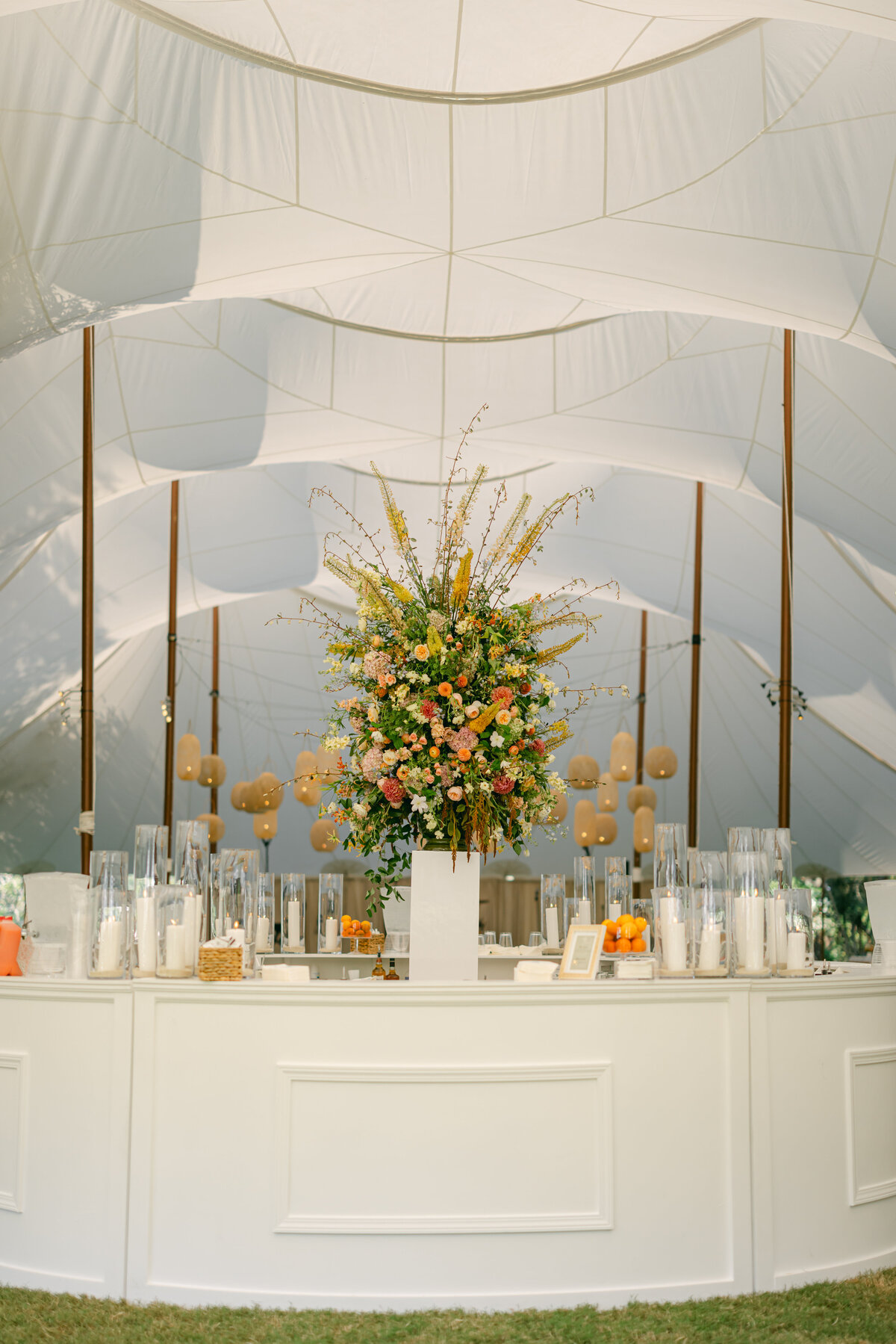 luxury-wedding-sailcloth-tent-white-bar-floral
