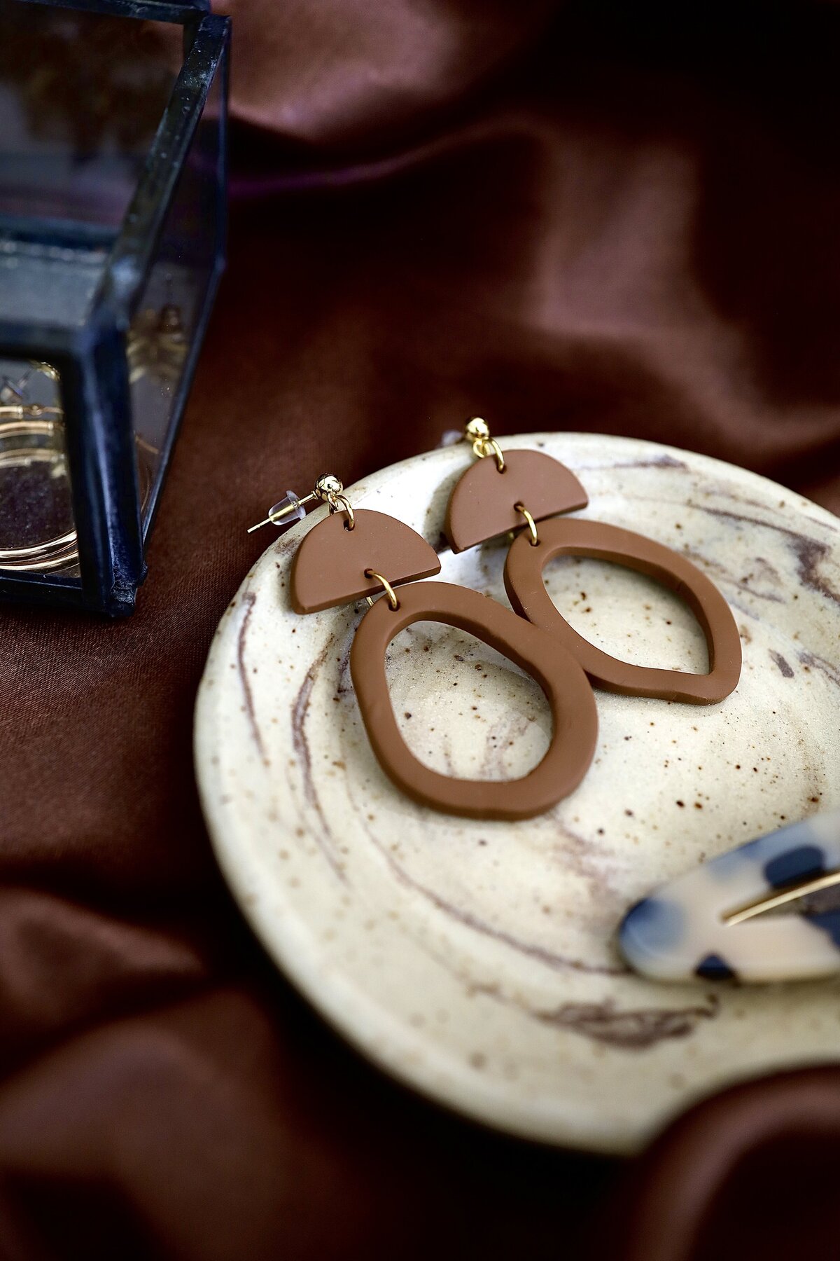 small business product photography stylized photoshoot brown clay polymer earrings