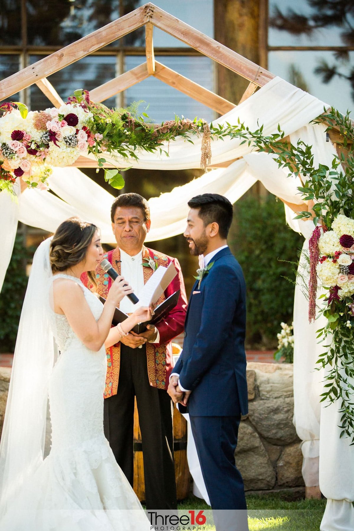 Bride saying her vows to her Groom