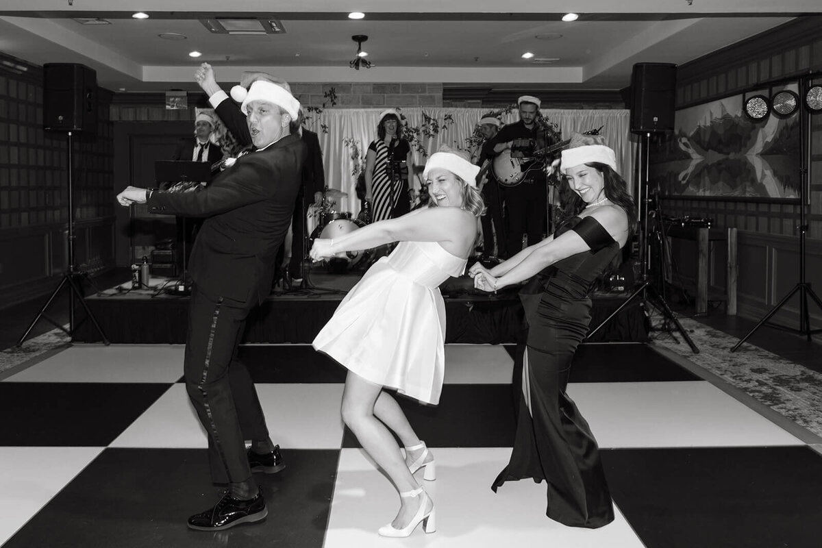 Father and daughter sharing a dance at St. Regis Aspen, captured in a heartfelt moment during the wedding reception.
