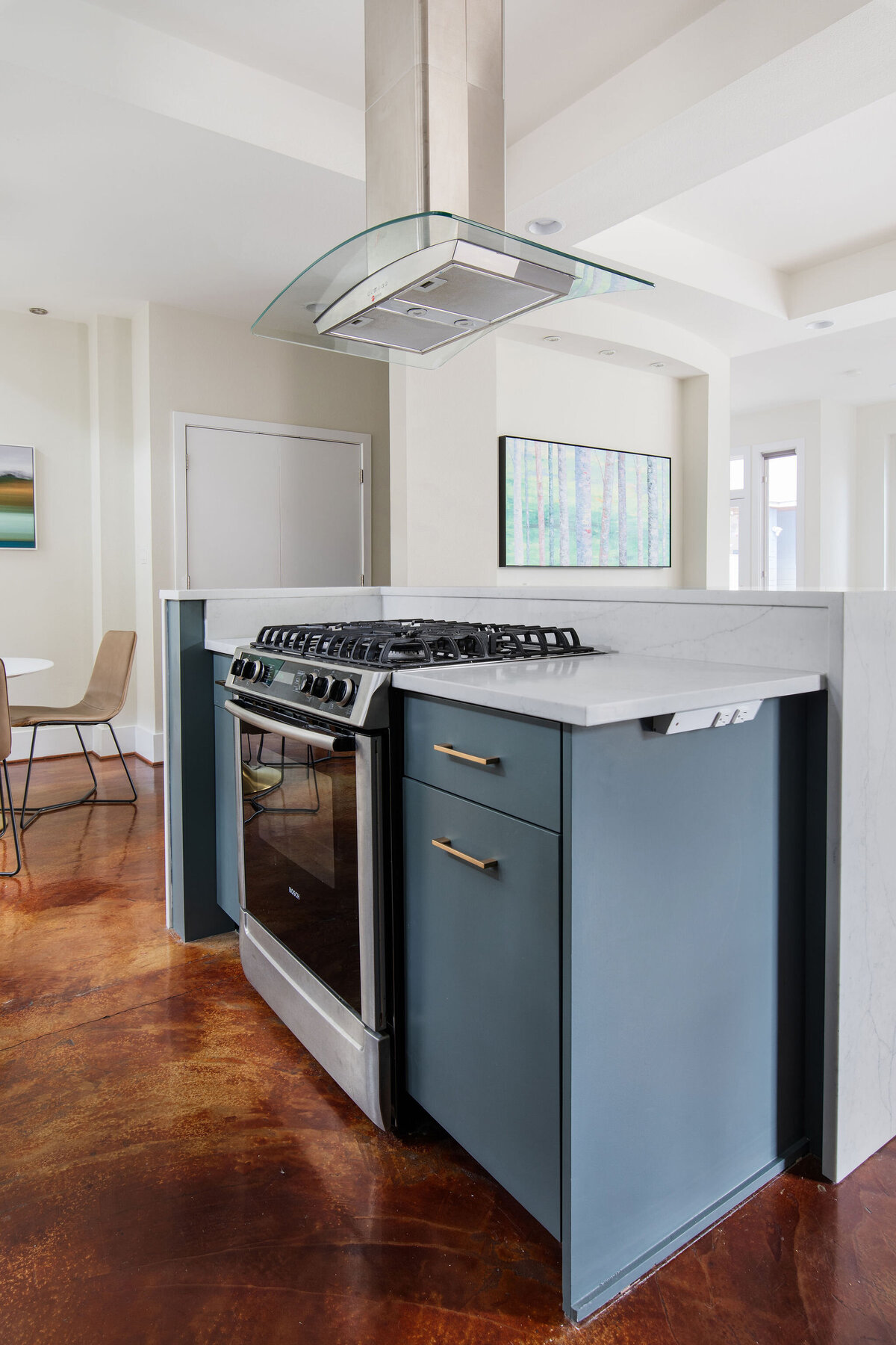 hello-home-Contemporary-Kitchen-Blue-Cabinets-Brass-Hardware-Stainless-Steel-Appliances-Polished-Concrete-Floor-Kitchen-Remodel-quartz-waterfall-island-Austin-TX-7