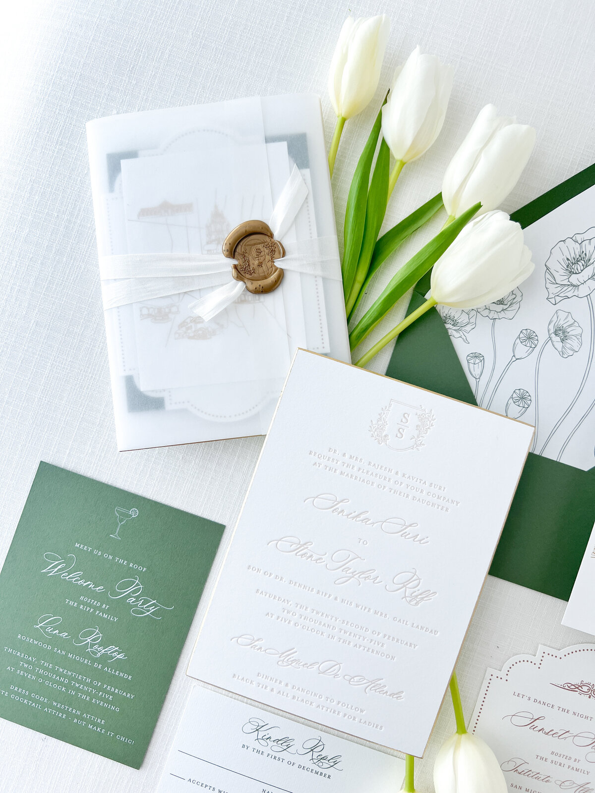 white and green wedding invitations with a clean design