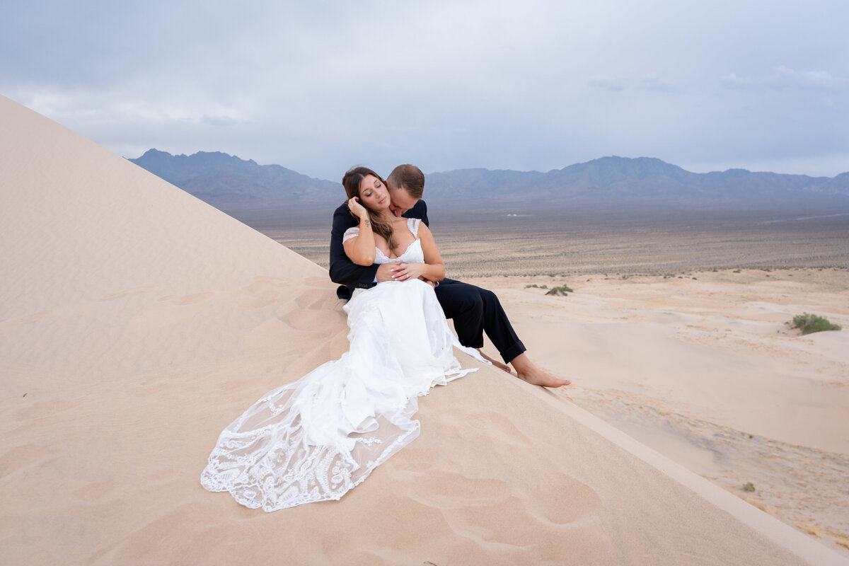 bride-groom-Kelso-Dunes-embracing