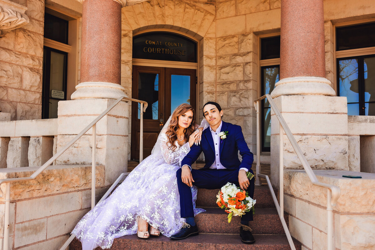 Dive into bliss with an intimate courthouse elopement in New Braunfels. A colorful celebration of love, where the only thing that matters is the adventure you're creating together.