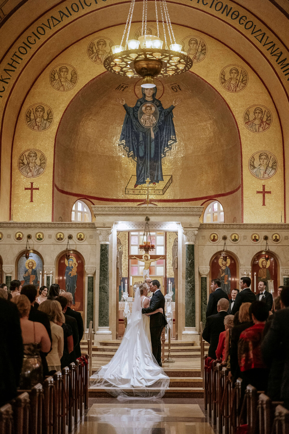 kiss-at-greek-wedding-ceremony